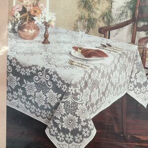 Vintage Lancaster 70 in. Round White laced tablecloth w/ soil release in Bag